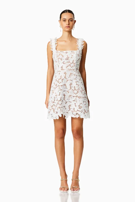 Printed Abstract Women Dress for a Modern and Artistic AppealPine Lace Mini Dress In White