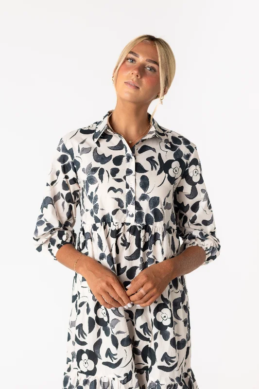 Mini Women Dress with a Short Hem for a Young and Trendy StyleBrass & Roe Janice Button Dress