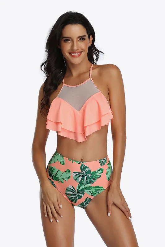 Swim sets with a pleated skirt for a more modest and feminine lookTropical Print Ruffled Two-Piece Swimsuit